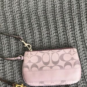 !! RESERVED!! Purple coach wristlet.